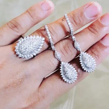 1 qram qızılın qiyməti 2024 750: Dəstə daxildir: Üzük, Sırğa, Bilərzik, Ağ qızıl, 750 Əyar, 1511 g — 1