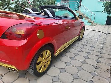 sukan uzlukleri: Opel Tigra TwinTop kabriolet-kupe - Korpus: 2 qapılı kabriolet, sərt — 6
