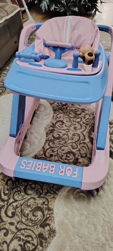 Iran Khodro: Uşaq gəzdirəci (yorğalı “walker”) - Rəng: çəhrayı–mavi - Ön panel — 2