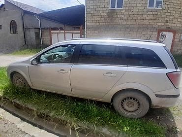 şuşeler: Opel Astra: 1.8 l | 2006 il Universal — 5