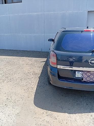 Opel Astra: 1.3 л | 2009 г. 440000 км Универсал — 6