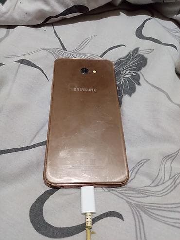 Компьютеры, ноутбуки и планшеты: Samsung Galaxy J4 Plus, цвет - Золотой, Сенсорный — 1