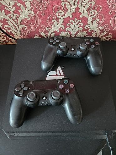 ps4 slim disk: Ps 4 slim 1 tr.tam ela veziyyetde,iki arijinal pult.prasifkali icinde — 4