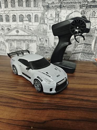 bas gitara: Radiouzaqlı idarə olunan mini avtomobil – drift üslubunda sport kupe — 1