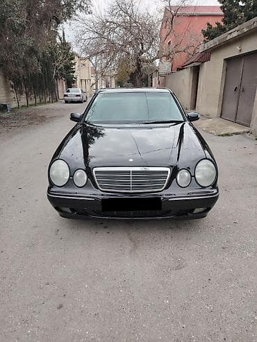 arxa suse: Mercedes-Benz E-Class: 2.2 l | 1999 il Sedan — 3
