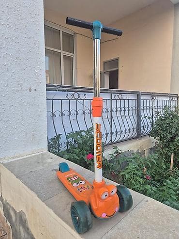 scooter ucuz: Uşaq skuterı – 3 təkərli, sükanla idarə olunan model. - Rəng: narıncı — 1