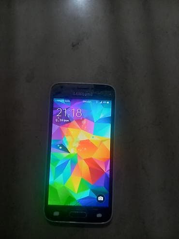 Samsung Galaxy S5 Duos, 16 ГБ, цвет - Черный, Две SIM карты