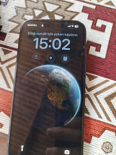 apple macbook: IPhone 15, 128 GB, Qara, Face ID — 2