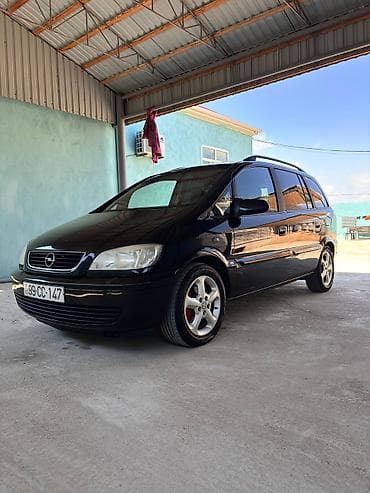 p4 disk: Opel Zafira: 1.8 l | 2004 il 350000 km Van/Minivan — 1