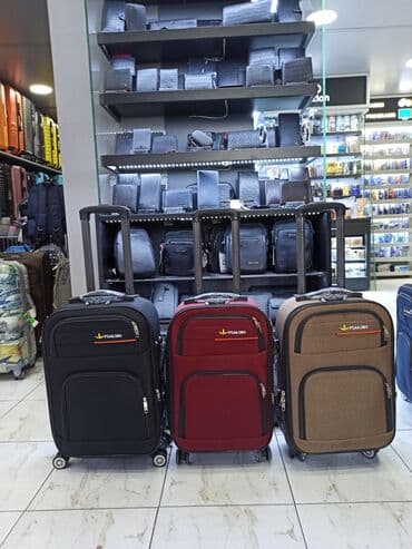 женские чемоданы из поликарбоната: S-45m. M-65m. L-95m Camadan satisi.Catdirilma ve temir.Magaza gece — 1