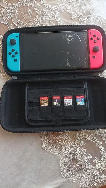 Nintendo Switch: Satılır Nintendo Switch konsol set: Nintendo Switch Konsol + 4 Oyun + — 1