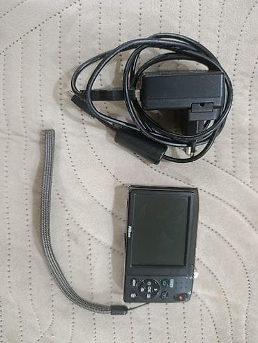 usb adapter: Nikon COOLPIX kompakt fotoaparat Xüsusiyyətlər: - Gümüşü korpus, ön — 2