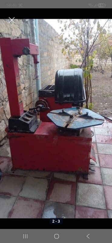 Konteynerlər: Avtomobil şinlərinin sökülüb-taxılması üçün şin dəyişmə aparatı - — 1