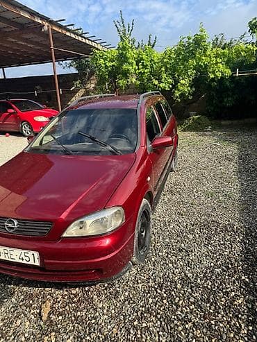 Opel: Opel Astra Caravan (Universal), qırmızı gövdə yalnız kredetlə — 5