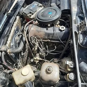 ucuz maşin: Model: LADA 2104 (universal kuzov) Rəng: qara Yanacaq: benzin Ötürücü — 3