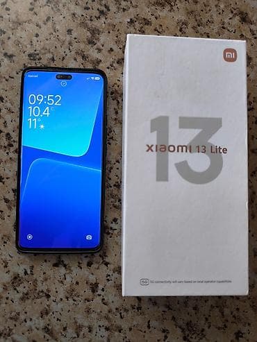 xiaomi note 10 lite: Xiaomi 13 Lite, 256 GB, rəng - Qara, 
 Sensor, Simsiz şarj, İki sim kartlı — 3