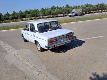 car parking multiplayer niva: Ağ rəngli, dördqapılı Lada 2106 avtomobili. Avtomobilin ön hissəsində — 4