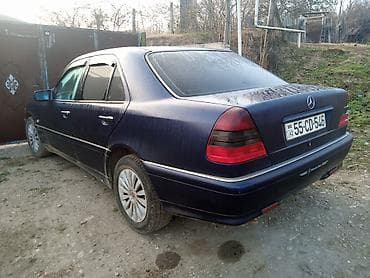 07 satılır: Mercedes-Benz E-sinfi (W210), sedan, tünd mavi rəng. - Kuzov: 4 qapı — 2
