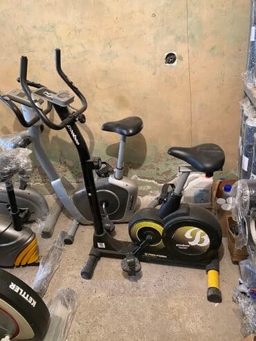 piknik oturacağı: Evdə məşq etmək üçün nəzərdə tutulmuş, qara rəngli velotrenajor. Bu — 1