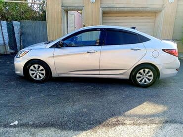 kia sportage 2006: Hyundai Accent: 1.4 l | 2016 il Sedan — 2