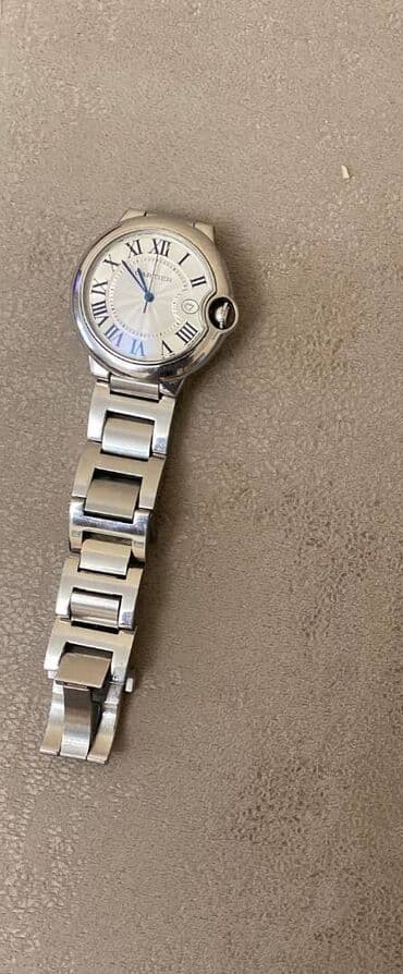 kisi ucun papaqlar: Qol saatı, Cartier — 1