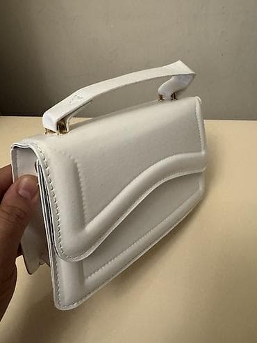 cuxol: Ağ mini çiyin/əl çantası

Yenidir istidade olunmayib — 2