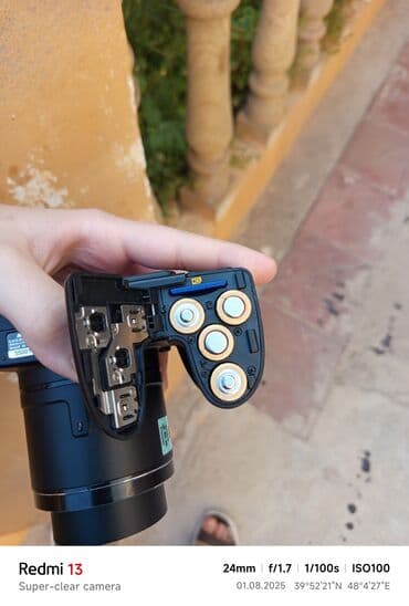 yemek bisiren aparat: Nikon brendinə məxsus qara rəngli fotoaparat, istifadəçilər üçün rahat — 6