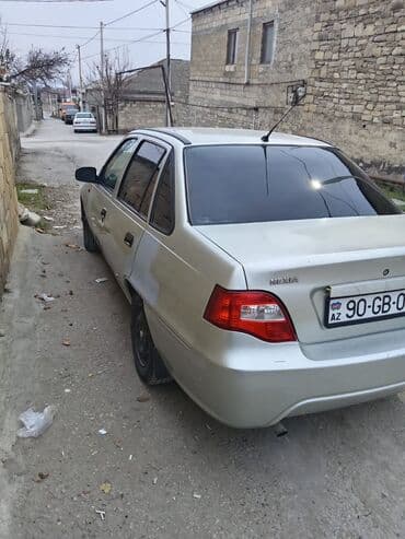 lider diskləri 07: Daewoo Nexia: 1.5 l | 2009 il Sedan — 2