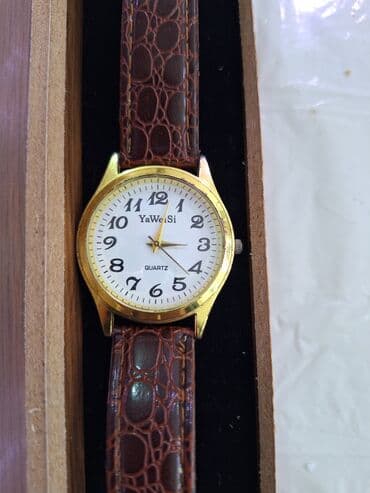 irshad telecom is saatlari: Б/у, Наручные часы, Cartier, цвет - Золотой — 1