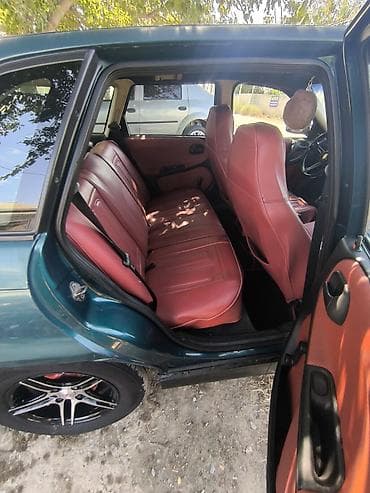 vectra b fara: Opel Astra F sedan - Kuzov: 4 qapılı sedan, tünd yaşıl rəng - Salon — 4