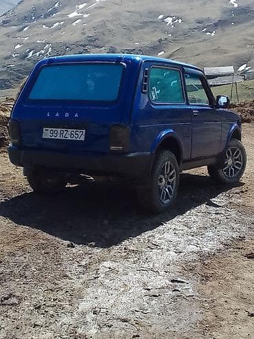 4 tekerlekli motor atv: VAZ (LADA) 4x4 Niva: 1.7 l | 1999 il 65843 km Ofrouder/SUV — 1
