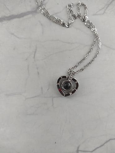 Çantalar: Gümüş rəngli zəncirli asma boyunbağılar – Kulonda 100 dildə "I LOVE — 4