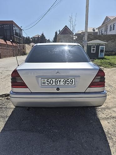 195 65 15 teker: Mercedes-Benz C-Sinif sedan, gümüş rəng. - Kuzov: 4 qapı, klassik W202 — 2