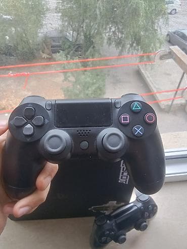 ps 4 orjinal: PlayStation 4 Slim oyun konsolu + 2 ədəd DualShock 4 idarəetmə pultu — 7