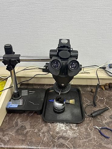 Stereoskopik trinokulyar mikroskop – zoom mexanizmi və stolüstü