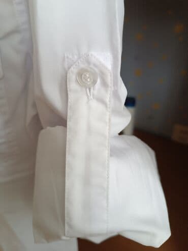 İdman dəstləri: Ağ köynək,M razmer.Bir dəfə geyilib.Səhifədə çoxlu köynəklər var,adın — 2