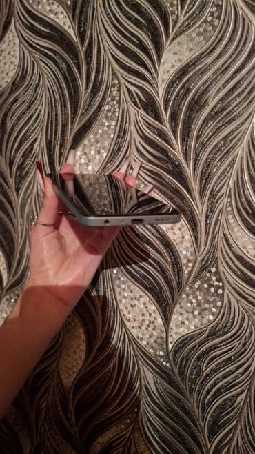 oppo reno 13 pro qiymeti: Oppo A58 4G — 2