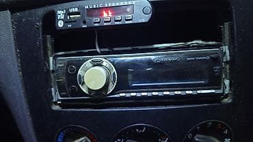 Avtomobil üçün səsgücləndirici və audio sistemi komplekti - Başlıq