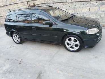 ремонт сидений авто: Opel Astra Caravan (universal) – tünd yaşıl rəng • Kuzov: universal — 2