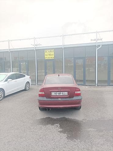 vaz 2106 abilsofka: Opel Vectra B sedan, tünd qırmızı rəng. - Kuzov: 4 qapılı sedan — 5