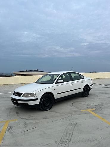Volkswagen Passat: 1.8 l | 1998 il Sedan — 1