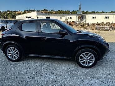 vaz 2107 starter: Nissan Juke, qara rəng, kompakt krossover. Xüsusiyyətlər: - Kuzov: 5 — 4