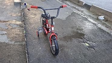 12 lik usaq velosipeti əla vəziyyətdədir hec bir problemi yoxdur usaq — 4