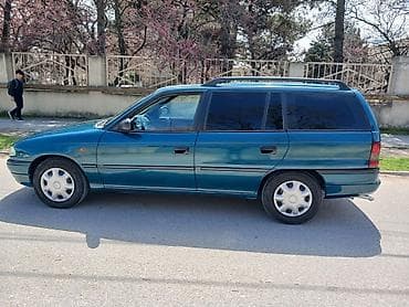 opel astra oluxanasi: Opel Astra F Caravan (universal), mavi rəng Xüsusiyyətlər:.1997 - — 7
