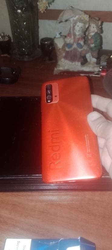 redmi note 12 kabro: Məhsul: Xiaomi Redmi smartfon (qırmızı korpus) Xüsusiyyətlər: - Arxa — 2