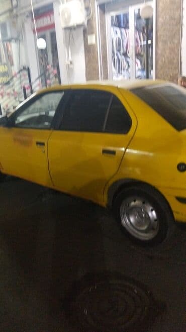 çirkab su maşını: Peugeot 405 (İran istehsalı – Samand/IKCO bazalı sedan) – sarı rəngdə — 6