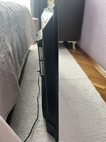 Смарт ТВ приставки: LCD/LED televiziya – təxminən 102düym diaqonallı, nazik çərçivəli — 2