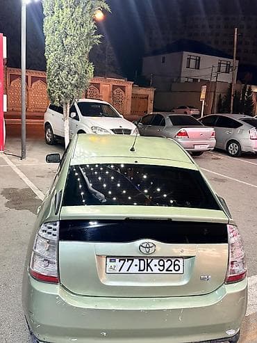 baqaj: Toyota Prius (2-ci nəsil) hibrid hetçbek - Gümüş-yaşıl rəngli kuzov — 6