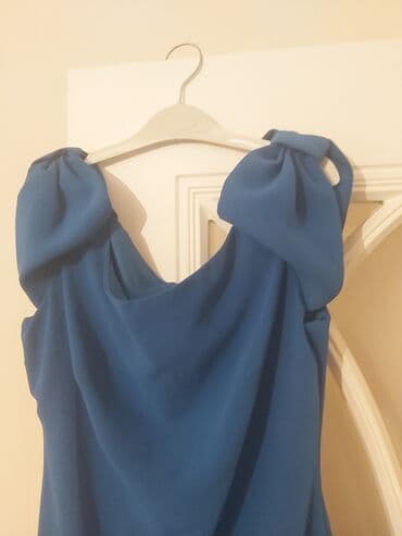 Куртки: Mavi rəngli qadın donu - Stil: Zərif və minimal dizayn, drapeli ön — 5