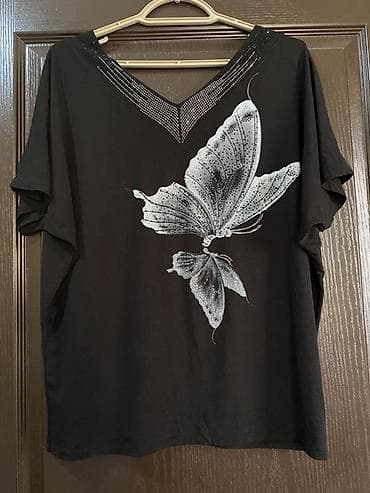 Qadın köynəyi – qara rəng, V-yaxa, qısa qollu. Ölçü 40-L. 42-XL. Tam